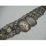 C20th Chinese belt set with Chinese and GB 6d coins, rectangular stamped 90 WH, 90 cm long 8.9oz