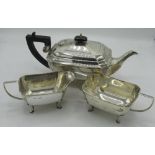 Geo.V hallmarked silver Art Deco design three piece tea service, angular tapering bodies on