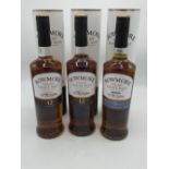 Bowmore Legend Islay Single Malt Scotch Whisky and two bottles of Bowmore Islay Single Malt Scotch