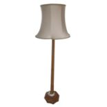 Robert Mouseman Thompson - oak standard lamp, tapering adzed octagonal column on stepped base,