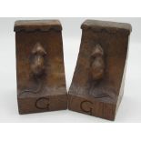 Robert Mouseman Thompson - pair of adzed oak book ends with penny moulded tops, both carved with