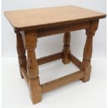 Robert Mouseman Thompson -oak joint type stool with rectangular top on four octagonal baluster legs