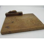 Robert Mouseman Thompson - oak rectangular cheese board, the knife rest carved with signature mouse,