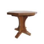 Robert Mouseman Thompson - oak coffee table, octagonal adzed top on cruciform column and