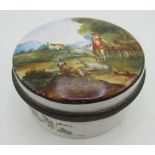 C19th Staffordshire enamel circular box, cover decorated with a study of a huntsman with three