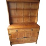 Robert Mouseman Thompson - oak dresser, twin shelved back with penny molded cornice, projecting base
