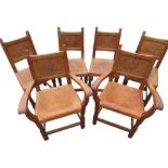 Thomas Gnomeman Whittaker - set of six oak dining chairs, solid panel backs carved with the arms