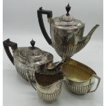 Victorian hallmarked silver four piece tea service, with part lobed ovoid bodies, tea pot and hot