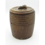 Robert Mouseman Thompson - turned oak biscuit barrel, cylindrical body with reeded frieze, the lid