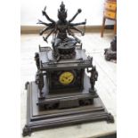 Large early C20th bronze clock surmounted by the Goddess Durga seated upon the galleried roof of a