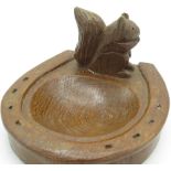 Wilf Squirrel Man Hutchinson - oak horseshoe ashtray, carved with signature squirrel, W12cm D11cm