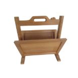Robert Mouseman Thompson - oak magazine rack with pierced handle on octagonal supports and sledge