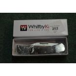Boxed Whitby Knives Company pocket knife with stainless steel clip blade with steel bolsters and