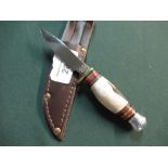 Small 2 1/2 inch bladed sheath knife by J. Nowill, Sheffield with swollen Sambar horn grip and