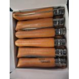 Box of twelve Opinell folding wood handled knives