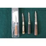 Collection of four pocket knives including a boxed as new Taylor's Eyewitness wooden handled