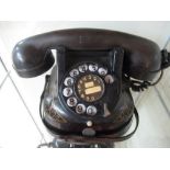 Mid 1950s Bell Telephone Company telephone with painted black alloy body and gilt highlights and
