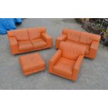 1960's style two piece suite comprising two 2 seater sofas, armchair & foot stool upholstered in