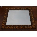 rectangular wall mirror in molded relief gilt wood frame 65 x 56cm