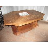 C20th pine occasional table with plank work top, central square canted corner recess on solid base