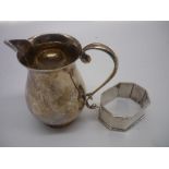 Geo.V hallmarked silver sparrow beak cream jug, Birmingham 1938 and an octagonal napkin ring,