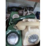 PO7O6L 1970s telephone in ivory finish three other similar telephones and two PO741 wall mounted