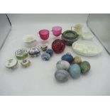 Glass paperweight, six glass eggs, collection of small ceramic and porcelain trinket dishes