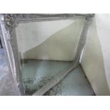 Large modern wall mirror with ornate silvered design frame, W140cm H115cm