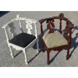 Matched pair of Geo.111 style corner elbow chairs, with mask head finial on turned supports one in