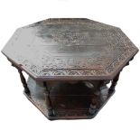 Victorian oak octagonal centre table, top carved with lunettes and leafage with moulded octagonal