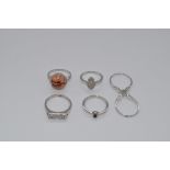 Collection of five sterling silver rings set with gemstones, all stamped 925, including a sterling