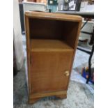 Small tier bedside cabinet with single cupboard door