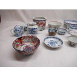 Two oriental tea pots, collection of Saki cups and bowls etc