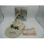 AC/DC baseball cap signed by Brian Johnson and Clifford Williams, concert ticket for music video