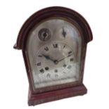 C20th arched top mahogany cased bracket clock, silvered dial with Roman chapter and subsidiary