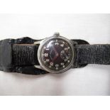 WWII Wehrmacht Revue Sport military hand wound wristwatch. Plated case on military style black
