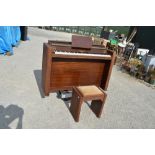 Eavestaff "minipiano", in art deco style in mahogany case. W140cm D44cm H90cm and similar stool. (2)