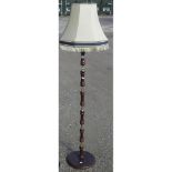 Black curved column floor lamp H150cm, a wooden and gilt metal lamp and shade H160cm (2)