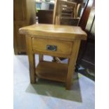 Modern oak bedside table of one drawer above shelved base W50cm D41cm H60cm