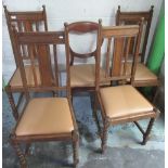 Set of four oak stick back dining chairs with tuned finials, turned front legs and tan faux