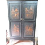 Early C20th black linen press, the two doors each with two C19th chinoiserie panels decorated with