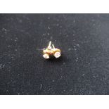 Pair of 18ct gold mounted diamond stud and post earrings with butterfly back fastening 0.7g (