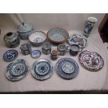 Collection of oriental vases, bowl and plates including a panchion style bowl