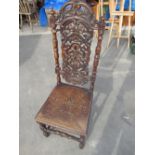 Early C20th oak hall chair with carved and pierced cresting rail, pierced and carved central splat