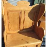 small pine wing back settle with scroll cresting and twin panel back, lifting seat W80 D40 H122