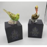 Royal Crown Derby budgerigar paperweight with gold cap, brown pelican paperweight with silver cap