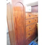 Victorian mahogany drop centre wardrobe, four cockbeaded drawers enclosed by pair of arched panel