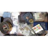 Box of miscellaneous items including a Royal Air Force badge, Acme scout whistle, various coinage