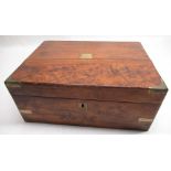 Victorian figured mahogany writing box with brass bound corners, escutcheon and blank cartouche