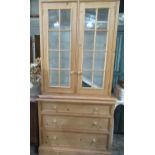 Pine side cabinet, two glazed doors above three plinth drawers W100cm D50cm H200cm